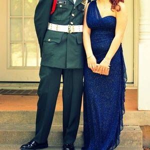 Floor length, one shoulder gown.